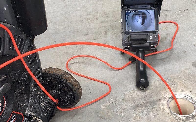 CCTV pipe inspection camera showing inside damaged pipe