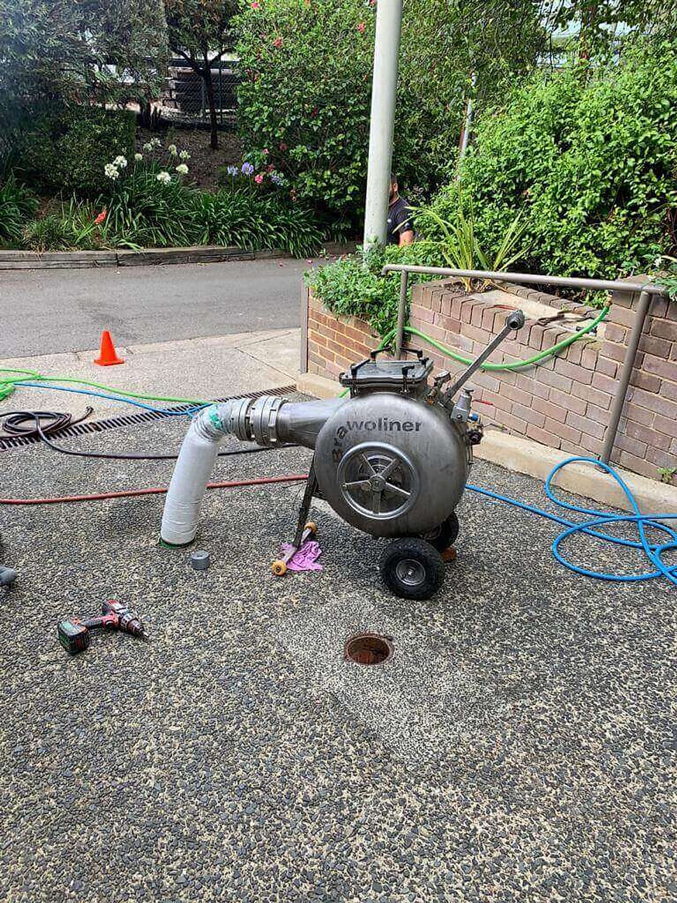 Pipe relining equipment set up in a tight Kirribilli access area